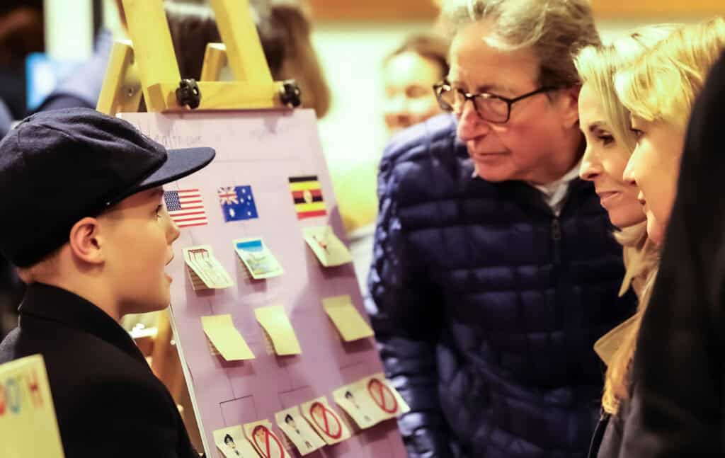 Tudor House student explaining his project to parents