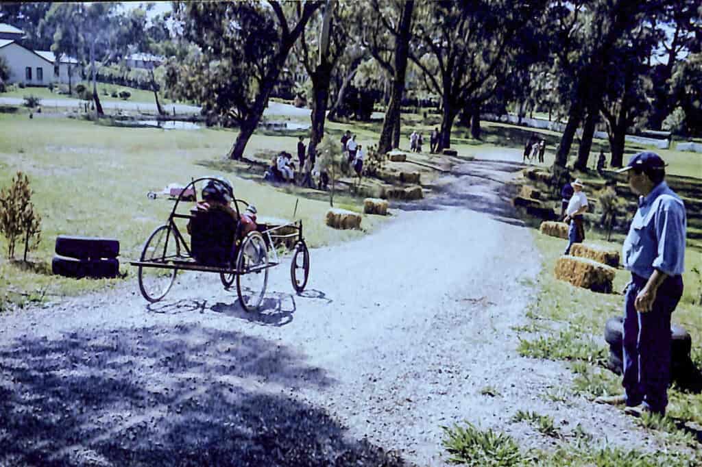 archival photo of past Tudor House students at Billy Cart Derby