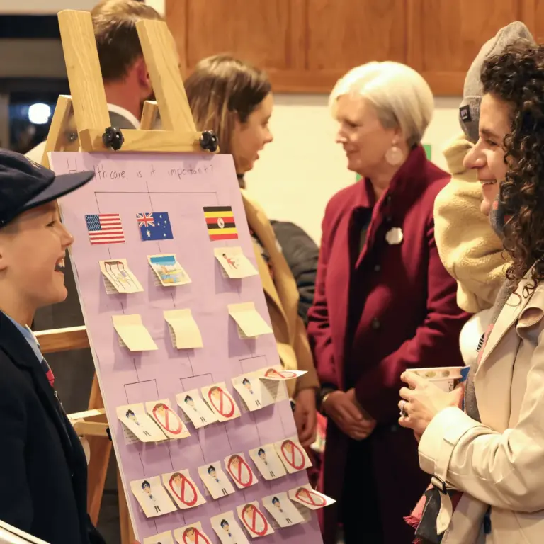 A Tudor House student presenting their work at the IB PYP Exhibition