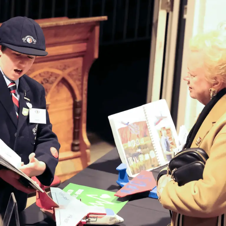 A Tudor House student presenting their work at the IB PYP Exhibition