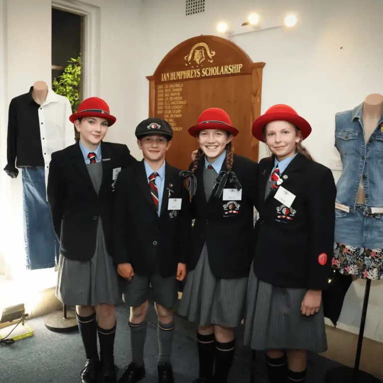 A Tudor House student presenting their work at the IB PYP Exhibition