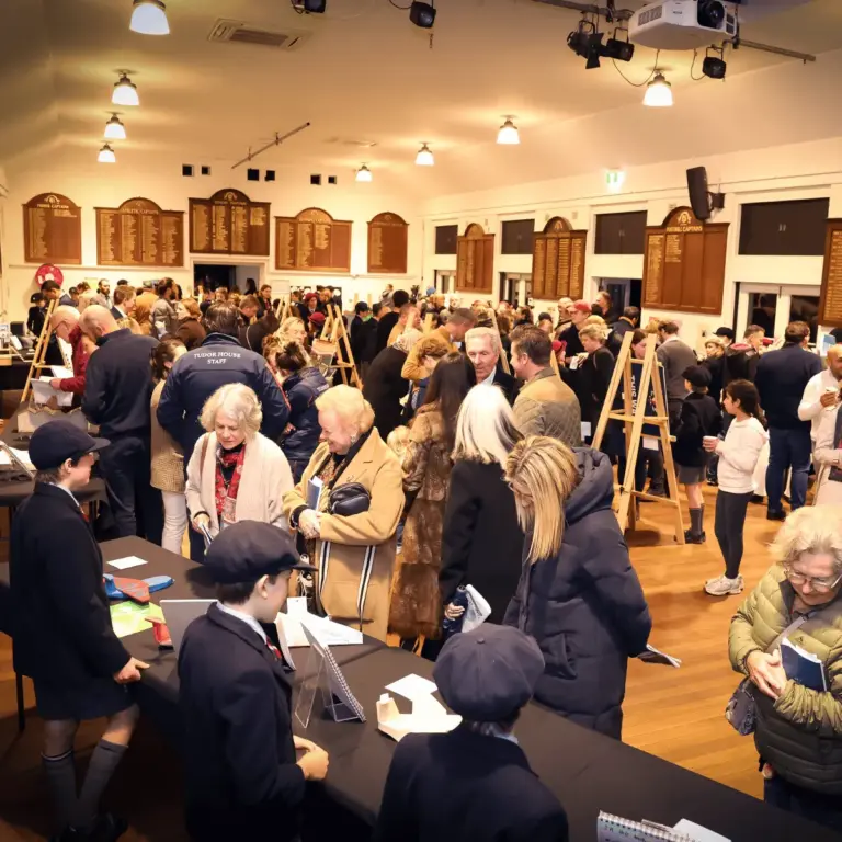 A Tudor House student presenting their work at the IB PYP Exhibition