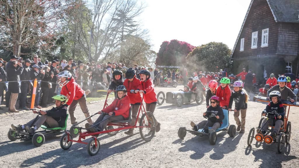 Students in billy carts ready to race